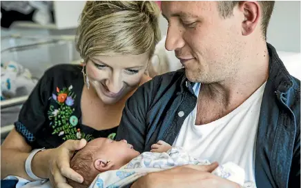  ?? PHOTO: BRADEN FASTIER/STUFF ?? Bec Brown and Nick Schryvers with baby Artie who was born on Thursday at Nelson Hospital. Schryvers only just made it to the birth.