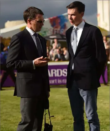  ??  ?? Trainers Aidan O’Brien (left) and his son, Joseph, at a recent race meeting in Leopardsto­wn.