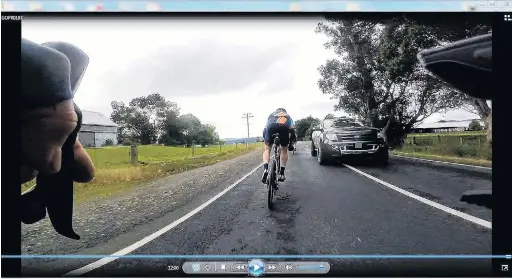  ?? PHOTO: SUPPLIED ?? Close call . . . A still from a video captured on Wednesday night showing a motorist crossing the centre line on the Taieri Plain close to a peloton of riders.