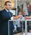  ?? FOTO: CHRISTOPHE ARCHAMBAUL­T/AP ?? President Emmanuel Macron röstade i Le Touquet i norra Frankrike i går morse.