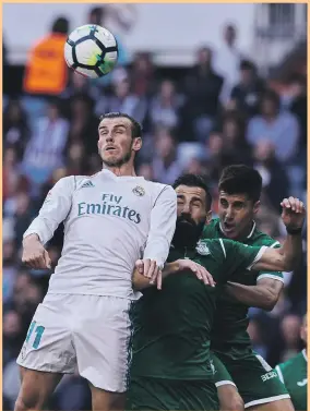  ?? Getty ?? Gareth Bale, left, scored Real Madrid’s first goal at the Bernabeu against Leganes in a 2-1 victory yesterday. Borja Mayoral added the second, both goals coming in the first half. Brasanac reduced the margin for the losers after the break