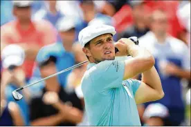  ?? GREENWOOD / GETTY IMAGES SAM ?? Bryson DeChambeau of the United States plays his shot from the eighth tee during the second round of the 3M Open at TPC Twin Cities on Friday in Blaine, Minnesota.