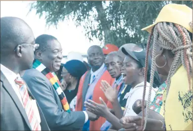  ?? — (Picture by Justin Mutenda) ?? President Mnangagwa is welcomed by chiefs and ZANU-PF officials during a tour of Ingwigwizi Bridge in Bubi, Matabelela­nd North Province, yesterday. — (More pictures on Page 8).