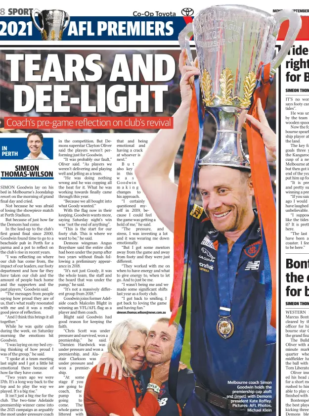  ?? ?? Melbourne coach Simon Goodwin holds the premiershi­p cup aloft and (inset) with Demons president Kate Roffey. Pictures: AFL Photos, Michael Klein