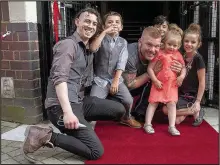  ??  ?? Luke Thomas, director of The Regent on Lancaster Road, Hinckley, boxer Martin Kohala who officially opened the venue and young guests Hennessey, Harry, Sidney and Senay at the launch party. Picture: Jordan Foster