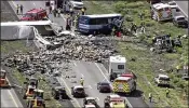  ?? KQRENEWS13 VIA AP ?? First responders work the aftermath of a deadly collision between a Greyhound passenger bus and a tractor-trailer truck on Interstate 40 in New Mexico near the Arizona border. Eight people were killed.