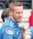  ??  ?? Adam Rooney celebrates his winner in the 4-3 victory.