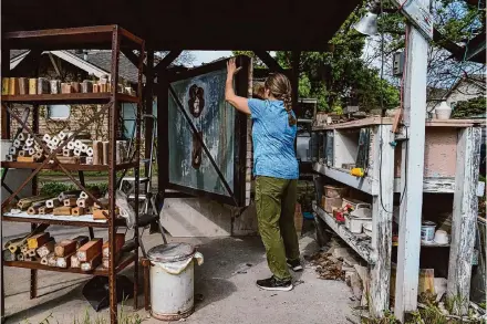  ?? Photos by Raquel Natalicchi­o/Staff photograph­er ?? Judy Adams, owner of Foelber Pottery, is among the commercial property owners in the historic Houston neighborho­od who are frustrated by the recent revival of the Montrose Management District, which went dormant in 2018.