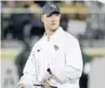  ?? JOHN RAOUX/ASSOCIATED PRESS ?? As rumors swirl about his future, Scott Frost says his 11-0 Knights deserve all of the attention.