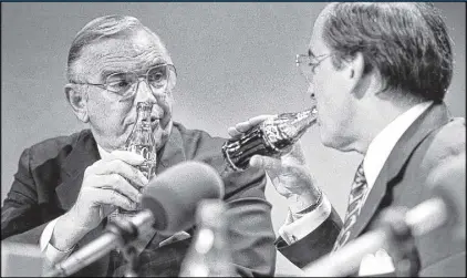  ?? AJC ?? Donald Keough (left) and Coca-Cola CEO Roberto Goizueta strengthen­ed Coke’s brand around the world and built lucrative relationsh­ips that bolstered the beverage giant overseas.