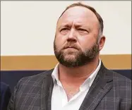  ?? J. Scott Applewhite / Associated Press file photo ?? Radio show host and conspiracy theorist Alex Jones at Capitol Hill in Washington in 2018.