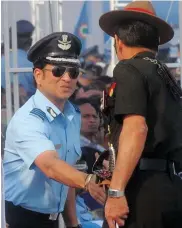  ?? — G. N. JHA ?? Honourary Group Captain Sachin Tendulkar greets Army Chief Gen. Dalbir Singh Suhag during the Air Force Day Parade 2015 at Air Force Station Hindon in Ghaziabad on Thursday.
