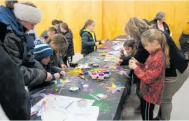  ??  ?? Tararua REAP had the youngsters making stars (right).