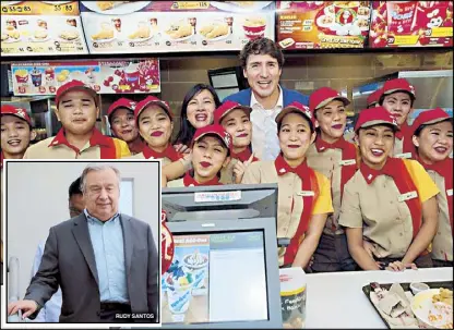  ??  ?? Canadian Prime Minister Justin Trudeau poses for a photo with the crew of Jollibee’s Manila North Harbor branch within hours after arriving in the country yesterday and visiting the non-government women’s health advocacy group Likhaan in Tondo. He...