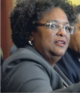  ??  ?? Prime Minister of Barbados Mia Mottley, the chair of the subcommitt­eee on single market issues, speaks at a press conference on July 7, at the conclusion of the 39th Meeting of Caricom Heads of Government, held at the Montego Bay Convention Centre. Prime Minister of Jamaica Andrew Holness is at centre, and Prime Minister of St Kitts-Nevis Timothy Harris is at right. The plans for a single capital market falls within the single market project.