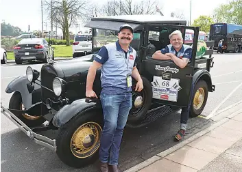  ?? ?? Tim and Jeremy Smith at the convoy’s gathering at Yarragon with their 1928 Ford Model A pickup. Tim and Jeremy said they were driving in honour of their father, who worked restoring cars before dying from MND.