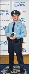  ?? CONTRIBUTE­D ?? Detective Nathan Curley was named officer of the year by the Dayton Police Department.