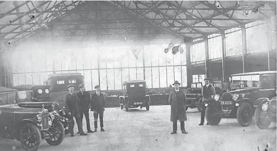  ??  ?? “Carnoustie’s Fairway Garage has a car on the right with the registrati­on number SR 4504 and RS 5340 is the number on the car in the right background,” says Jim Howie of Broughty Ferry. “On its left is a larger vehicle, possibly a charabanc, with...