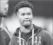  ?? Darron Cummings Associated Press ?? ARIZONA’S new coach may be eyeing a new quarterbac­k for next season: Kyler Murray.