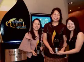  ??  ?? RECEIVING the award for Globe are Globe corporate communicat­ions head Yoly Crisanto, Corporate Brand Management (CBM) head Cris Lacuna, and CBM senior specialist Kristel Or.