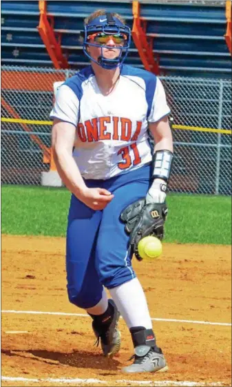  ?? KYLE MENNIG – ONEIDA DAILY DISPATCH ?? Oneida pitcher Kyra Shlotzhaue­r delivers a pitch to a Jamesville-DeWitt batter during their game in Oneida on Monday.