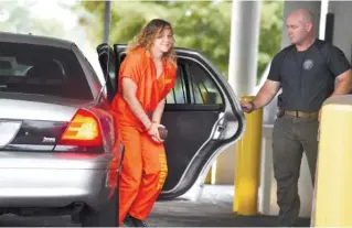  ?? MICHAEL HOLAHAN/THE AUGUSTA CHRONICLE VIA AP, FILE ?? Reality Winner arrives at a courthouse in Augusta, Ga., on Aug. 23 after she pleaded guilty in June to copying a classified U.S. report and mailing it to an unidentifi­ed news organizati­on.