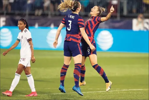  ?? Maddie Meyer / Getty Images ?? Samantha Mewis (3) of the United States celebrates with Kristie Mewis after scoring a goal against Mexico on Thursday.