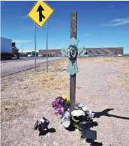  ?? ADOLPHE PIERRE-LOUIS/JOURNAL ?? Mourners have left a memorial by the side of southbound Interstate 25 just south of the Montaño exit, where 27-year-old James Porter was shot and killed.