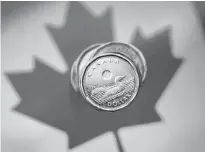  ?? MARK BLINCH/REUTERS ?? A Canadian dollar coin, commonly known as the “loonie,” is pictured in this illustrati­on picture taken in Toronto.