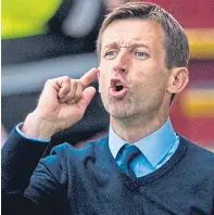  ??  ?? Dundee manager Neil McCann makes his point.