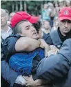  ?? DARIO AYALA ?? Esteban Torres Wicttorff, a known activist in the trans community, is arrested by police during a 2016 vigil at Parc de l’Espoir in Montreal.