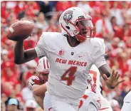  ?? MORRY GASH/ASSOCIATED PRESS ?? Junior transfer quarterbac­k Sheriron Jones is due to get the first start of his UNM career Saturday when the Lobos face New Mexico State in Las Cruces. Jones had a touchdown pass last week at Wisconsin.