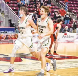  ?? APRIL GAMIZ/THE MORNING CALL ?? Allentown Central Catholic’s Liam Joyce, left, and Griffin Patridge celebrate after beating Hickory in the PIAA Class 4A boys basketball championsh­ip game in Hershey on March 25.