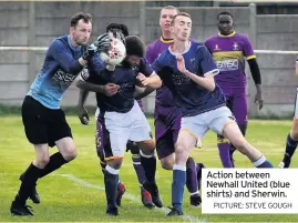  ?? PICTURE: STEVE GOUGH ?? Action between Newhall United (blue shirts) and Sherwin.