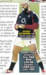  ??  ?? STICKY SITUATION Joe Marler tapes up yesterday
