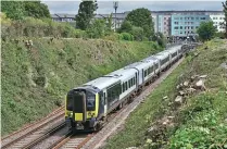  ?? STEPHEN GINN ?? SWR Class 444 ‘Desiro’ EMU No. 444042 departs Dorchester South on July 1 working the 2W09 10.24 Bournemout­h-Weymouth service, truncated because of Covid-19. Now rebranded into full SWR livery it is interestin­g to note 042 has adopted the revised and simplified version first seen on the company’s Class 159s without the blue/grey diagonal stripes on the body sides.