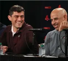  ?? NANCY LANE / BOSTON HERALD ?? Chief Baseball Officer Chaim Bloom and manager Alex Cora share a laugh during Monday’s season-ending press conference.