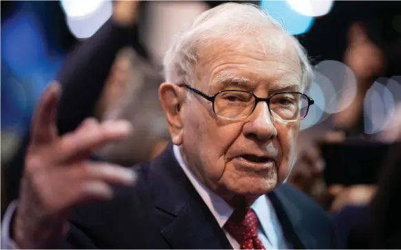  ?? AFP ?? Berkshire Hathaway chief Warren Buffett’s search for undervalue­d assets led him to spend $5.1bn in buy-backs in the second quarter