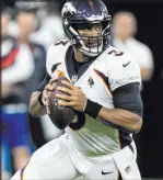  ?? Kyusung Gong The Associated Press ?? Broncos QB Russell Wilson, who has a hamstring injury, will be sidelined Sunday for the fourth game in his 11-year NFL career.