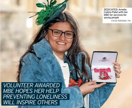  ?? STEVE PARSONS / PA ?? DEDICATED: Amelia Collins-Patel with her MBE for services for young people
