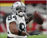  ?? RICK SCUTERI — THE ASSOCIATED PRESS ?? Raiders receiver Antonio Brown warmed up before Thursday’s game, but he was a no-show Sunday.