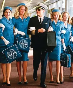  ??  ?? Outdated: Leonardo DiCaprio in a pilot’s uniform with a group of air hostesses in the film Catch Me If You Can