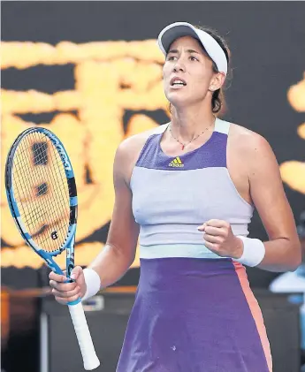  ??  ?? Garbine Muguruza celebrates her win against Simona Halep.