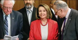  ?? CHIP SOMODEVILL­A / GETTY IMAGES ?? Speaker of the House Nancy Pelosi, with Senators Bernie Sanders (left) and Charles Schumer, expressed security concerns in her letter to President Donald Trump, but several Republican­s viewed the move as a political ploy. Inviting the president to give the speech to Congress is usually pro forma.