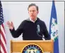  ?? Christian Abraham / Hearst CT Media ?? Gov. Ned Lamont holds a news conference on Wednesday at the Stamford Transporta­tion Center to promote the use of the free walk-in vaccinatio­n clinic located there in Stamford.