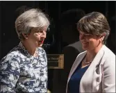  ??  ?? Theresa May and DUP leader Arlene Foster, right.