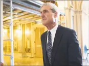  ?? J. Scott Applewhite / Associated Press file photo ?? In this June 21, 2017, photo, special counsel Robert Mueller departs after a meeting on Capitol Hill in Washington. A redacted version of Mueller's Russia report was released Thursday.