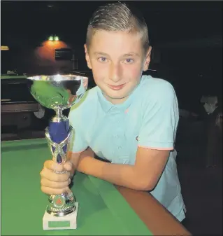  ??  ?? SILVERWARE George Laxton with his Cuestars trophy