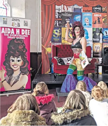  ?? ?? Drag Queen Story Hour UK’s Sab Samuel performing in front of primary school children as Aida H Dee