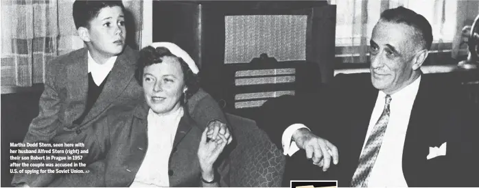  ?? AP ?? Martha Dodd Stern, seen here with her husband Alfred Stern ( right) and their son Robert in Prague in 1957 after the couple was accused in the U. S. of spying for the Soviet Union.